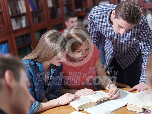 happy young teens group in school on chemisty lessons and library education happy young teens group in school on chemisty lessons and library education