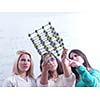 happy young teens group in school on chemisty lessons and library education