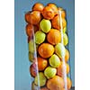 fresh healthy fruits decoration in glass dish and spiral formation