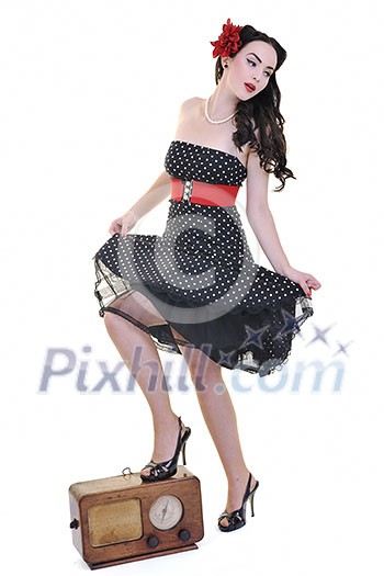 pretty girl listening music on radio isolated on white in studio pretty girl listening music on radio isolated on white in studio