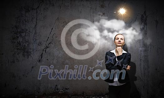 Image of concentrated businesswoman looking for answer Image of concentrated businesswoman looking for answer