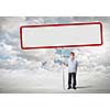 Young man on road holding blank banner. Place for text