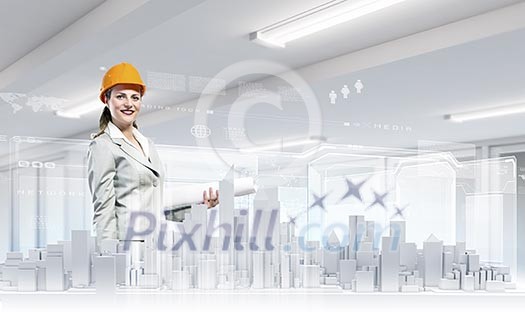 Woman engineer in hardhat examining construction project Woman engineer in hardhat examining construction project