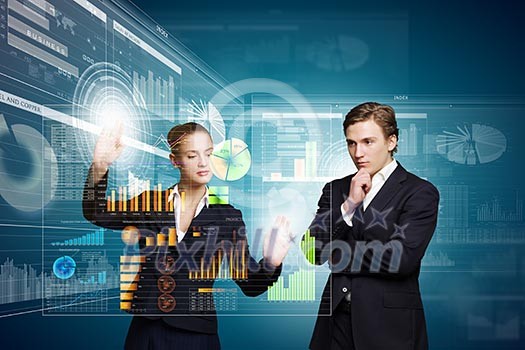 Businessman and businesswoman touching icon of digital screen Businessman and businesswoman touching icon of digital screen