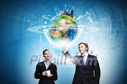 Businessman and businesswoman touching icon of digital screen. Elements of this image are furnished by NASA Businessman and businesswoman touching icon of digital screen. Elements of this image are furnished by NASA