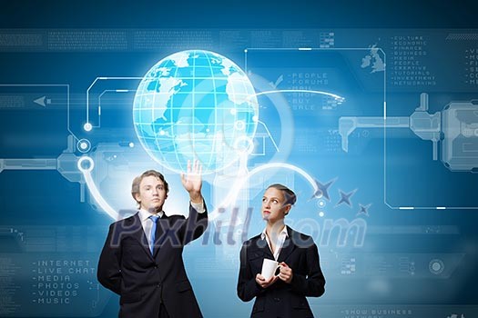 Businessman and businesswoman touching icon of digital screen Businessman and businesswoman touching icon of digital screen