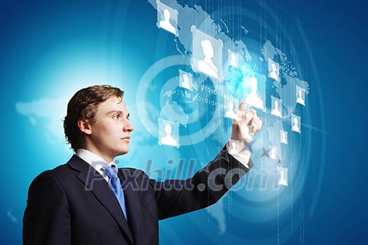 Businessman in suit touching icon of media screen Businessman in suit touching icon of media screen