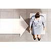 Top view of thoughtful businesswoman sitting on chair