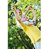 happy grandfather and child have fun and play in park