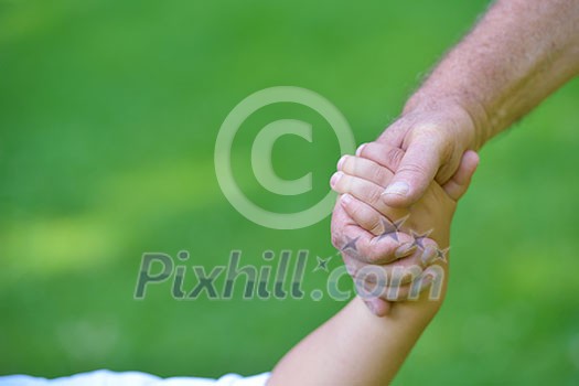happy grandfather and child have fun and play in park happy grandfather and child have fun and play in park