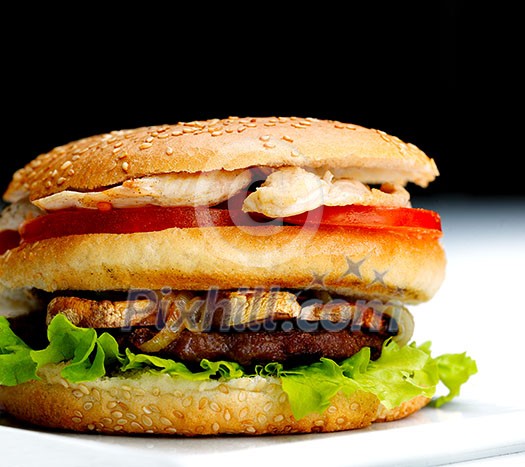 still life with fast food hamburger menu, french fries, soft drink and ketchup still life with fast food hamburger menu, french fries, soft drink and ketchup
