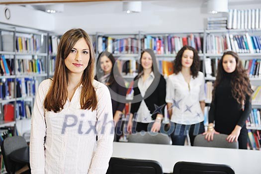 happy student woman group portrait at library happy student woman group portrait at library