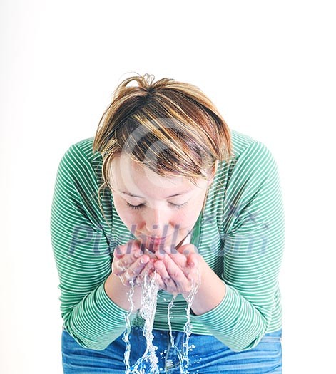 bautiful young woman wash face with clean water isolated on white in studio bautiful young woman wash face with clean water isolated on white in studio