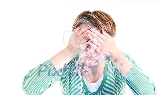 bautiful young woman wash face with clean water isolated on white in studio bautiful young woman wash face with clean water isolated on white in studio