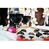 luxury and sweet praline and chocolate with wine bottle and glasses  decoration