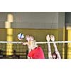 volleyball game sport with group of girls indoor in sport arena