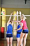 volleyball game sport with group of girls indoor in sport arena