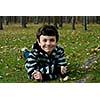 happy boy  jumping in the park, joy, emotion