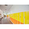 High School hallway showing yellow student lockers