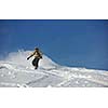 freestyle snowboarder jump and ride free style  at sunny winter day on mountain