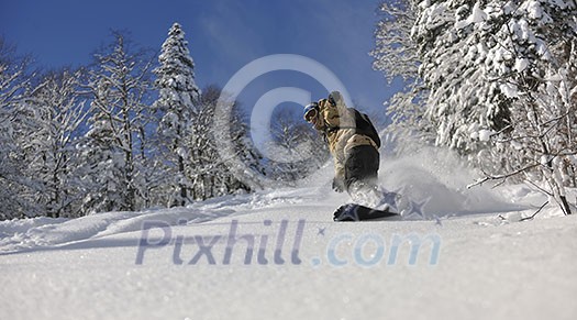 freestyle snowboarder jump and ride free style at sunny winter day on mountain freestyle snowboarder jump and ride free style at sunny winter day on mountain