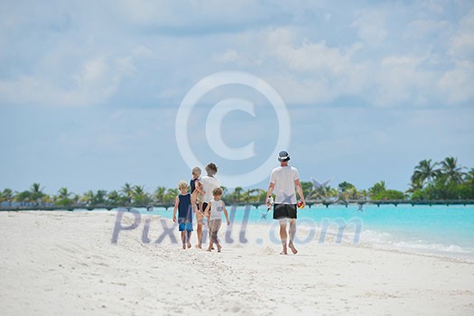 Portrait of a happy family on summer vacation at beach Portrait of a happy family on summer vacation at beach