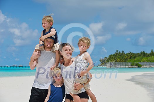 Portrait of a happy family on summer vacation at beach Portrait of a happy family on summer vacation at beach