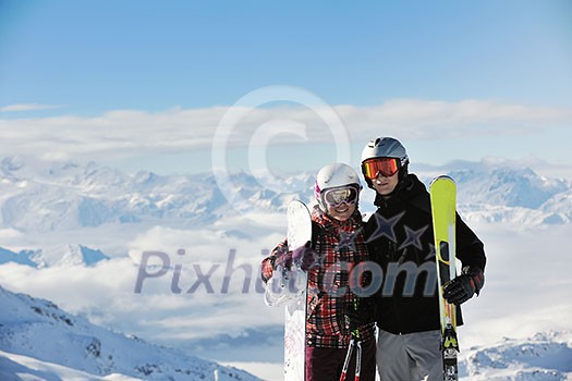 happy people group have fun on snow at winter season on mountain with blue sky and fresh air happy people group have fun on snow at winter season on mountain with blue sky and fresh air