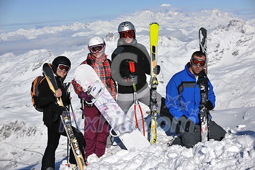 happy people group have fun on snow at winter season on mountain with blue sky and fresh air happy people group have fun on snow at winter season on mountain with blue sky and fresh air