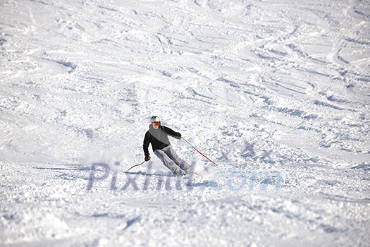 young athlete man have fun during skiing sport on hi mountain slopes at winter seasson and sunny day