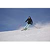 young athlete man have fun during skiing sport on hi mountain slopes at winter seasson and sunny day