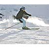 young healthy woman skiing on fresh snow at winter season in france alps