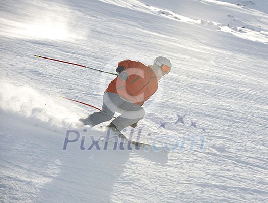 young athlete man have fun during skiing sport on hi mountain slopes at winter seasson and sunny day young athlete man have fun during skiing sport on hi mountain slopes at winter seasson and sunny day
