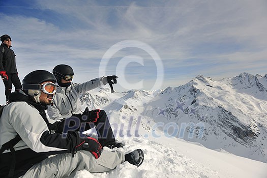 happy people group have fun on snow at winter season on mountain with blue sky and fresh air happy people group have fun on snow at winter season on mountain with blue sky and fresh air