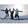 happy people group have fun on snow at winter season on mountain with blue sky and fresh air