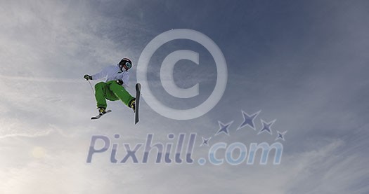 extreme freestyle ski jump with young man at mountain in snow park at winter season extreme freestyle ski jump with young man at mountain in snow park at winter season