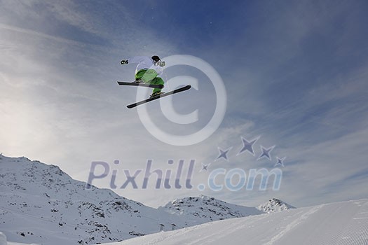 happy young man have fun at mountain peak on winter season with beautiful sunset happy young man have fun at mountain peak on winter season with beautiful sunset