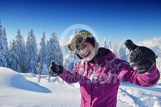 happy young ski woman at mountaint top on winter have fun happy young ski woman at mountaint top on winter have fun