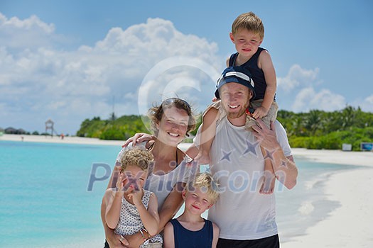 Portrait of a happy family on summer vacation at beach Portrait of a happy family on summer vacation at beach