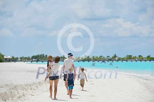 Portrait of a happy family on summer vacation at beach Portrait of a happy family on summer vacation at beach