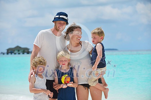 Portrait of a happy family on summer vacation at beach Portrait of a happy family on summer vacation at beach