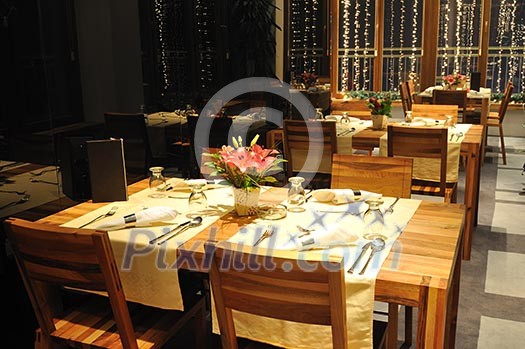 luxury modern indoor restaurant with wooden chairs and tables luxury modern indoor restaurant with wooden chairs and tables