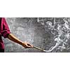 Young handsome man painter with brush in hand