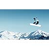 Snowboarder making jump high in clear sky