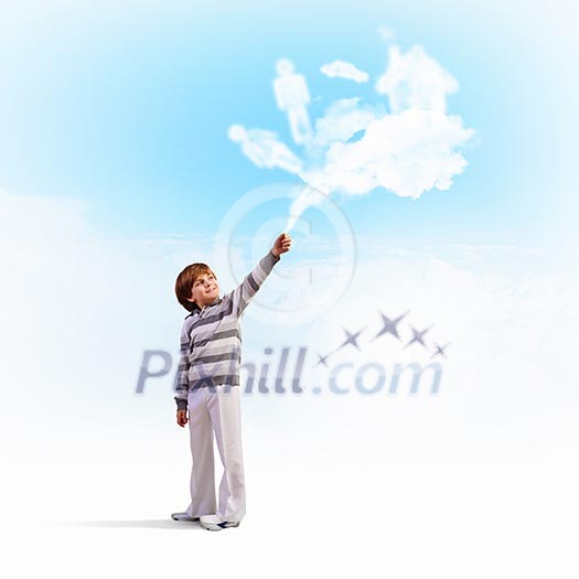 Image of little cute boy catching clouds in sky Image of little cute boy catching clouds in sky
