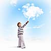 Image of little cute boy catching clouds in sky