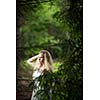Lovely bride outdoors in a forest