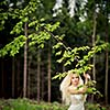 Lovely bride outdoors in a forest