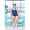 happy little child portrait on swimming school classes and recreation at indoor pool