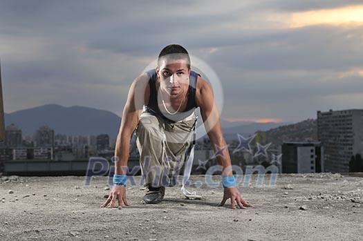 man on the start position ready to run man on the start position ready to run